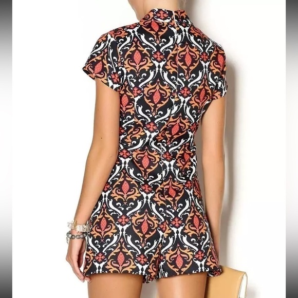 Elliatt Wonderland High Neck Printed
Playsuit, New with Tags - Picture 7 of 9